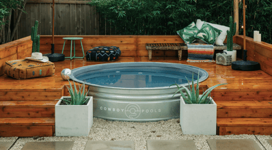 stock tank pool built around a deck